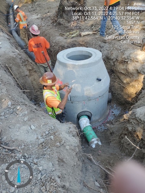 construction workers performing sewer system upgrades